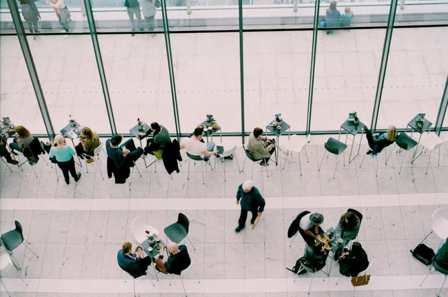 People gathered in a room with chairs